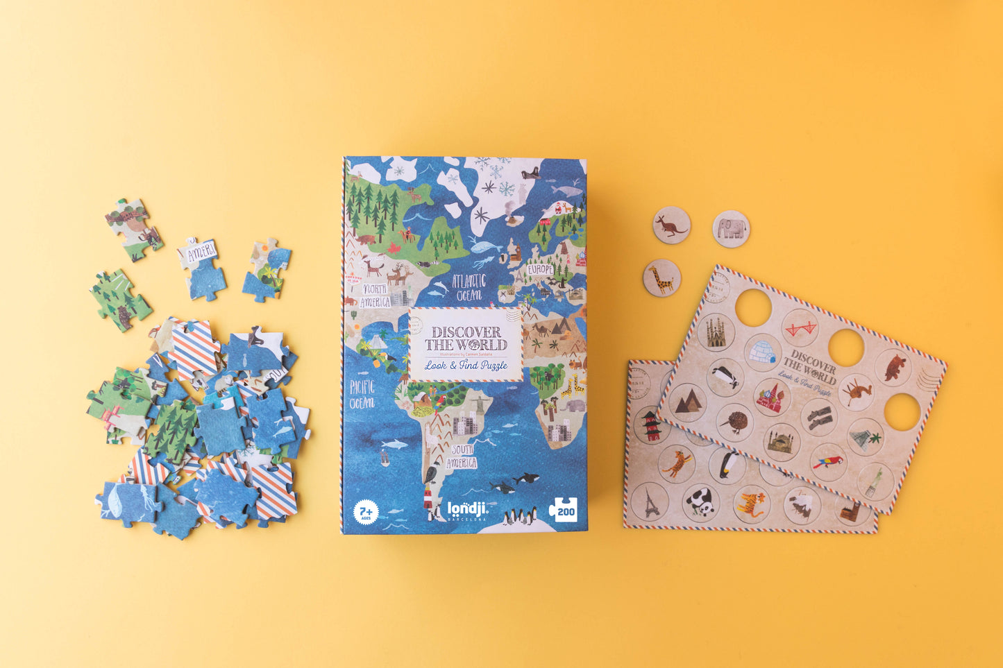 Children's puzzle set with world map design on a yellow background
