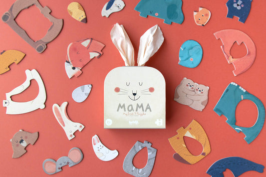 Box labeled 'MAMA' surrounded by various animal-shaped cutouts on a red background