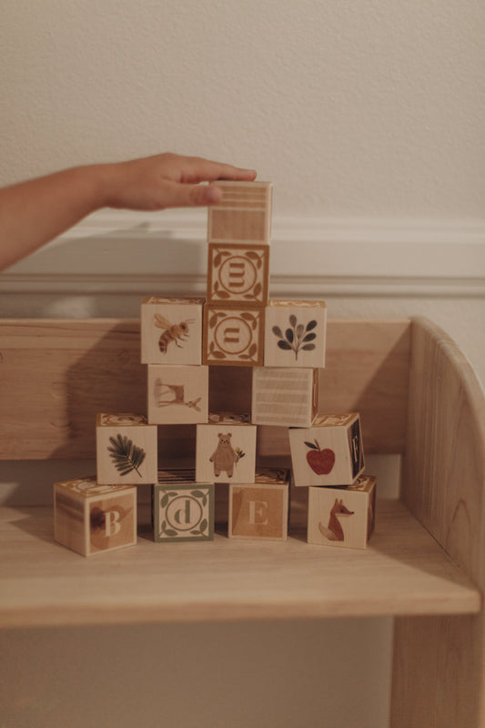 kids playing with ABC blocks 