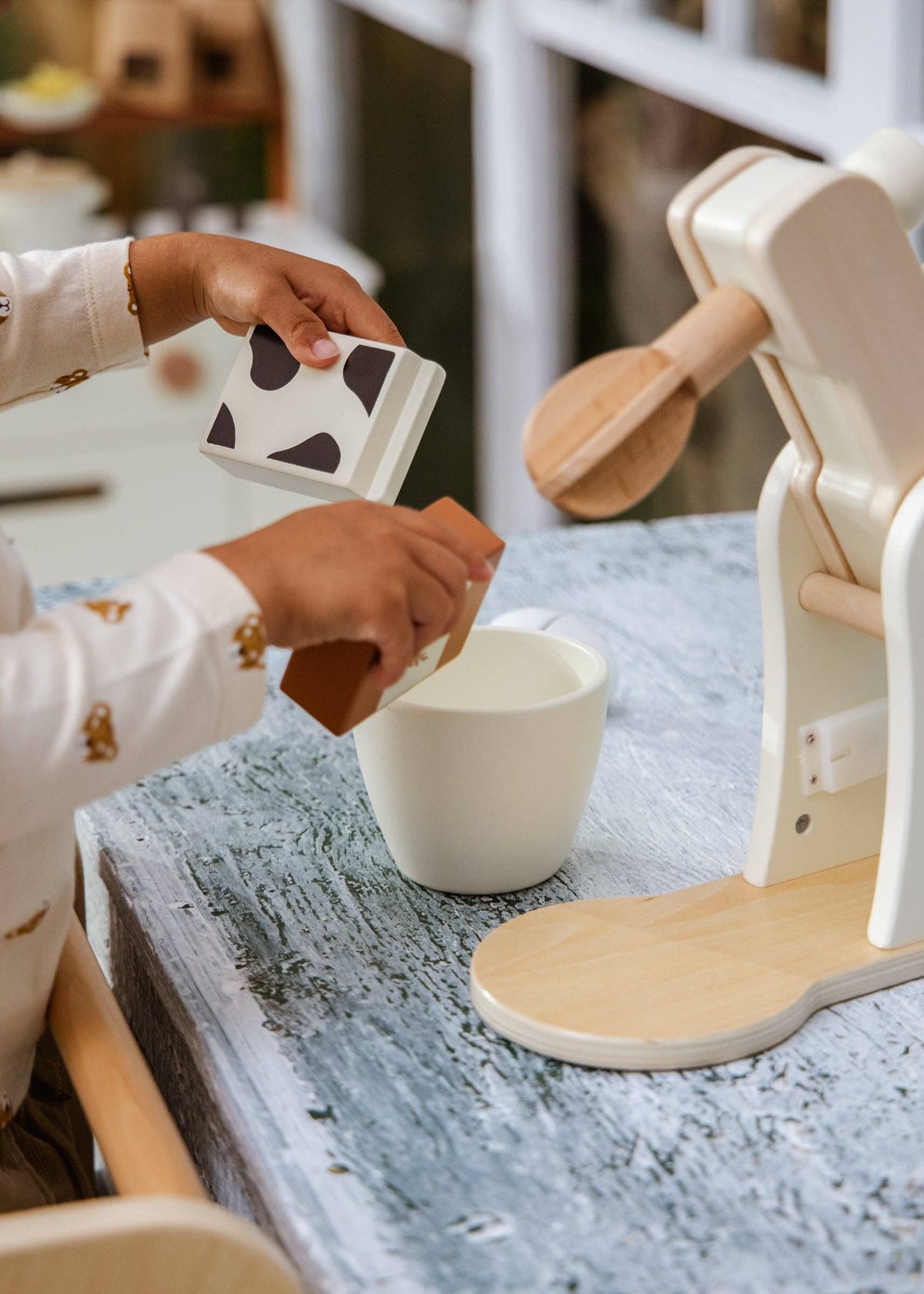 Wooden pretend play accessories: milk carton, flour carton, and egg