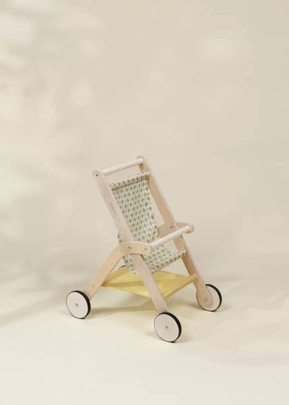 Wooden doll stroller with woven basket on white background