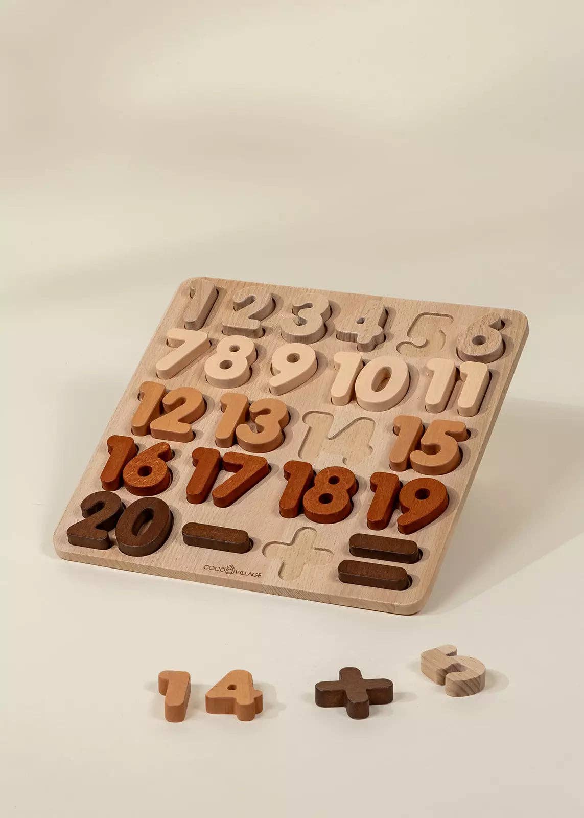 Wooden number puzzle pieces removed and displayed