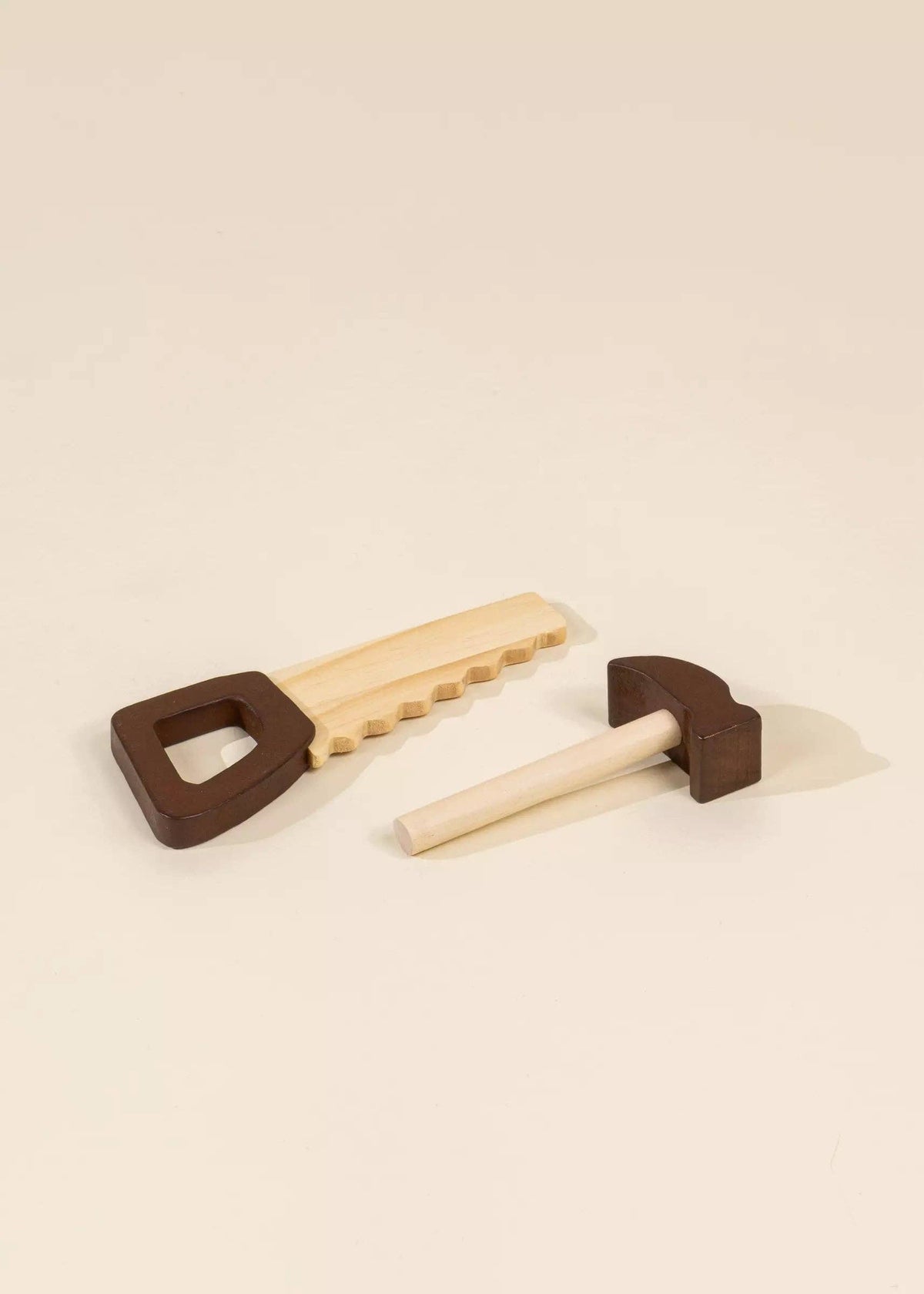 Wooden tool playset pieces arranged individually