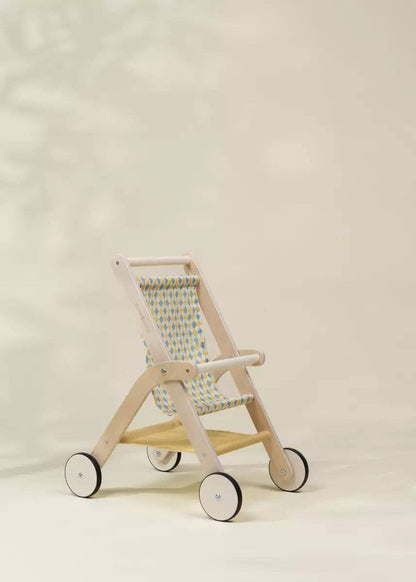 Close-up of wooden doll stroller wheels and frame