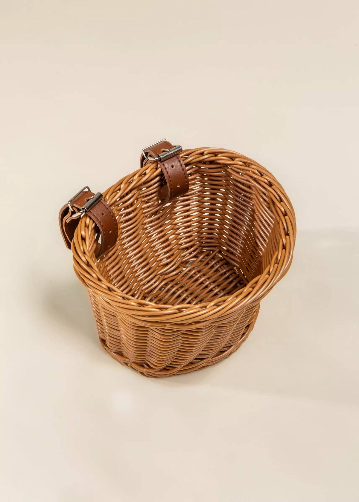Bike basket shown empty on white background