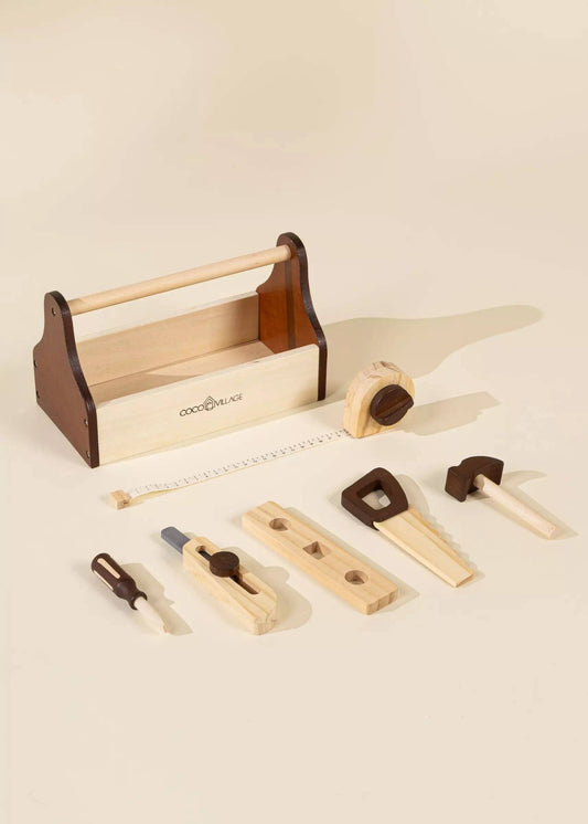Close-up of wooden hammer and screwdriver from tool playset
