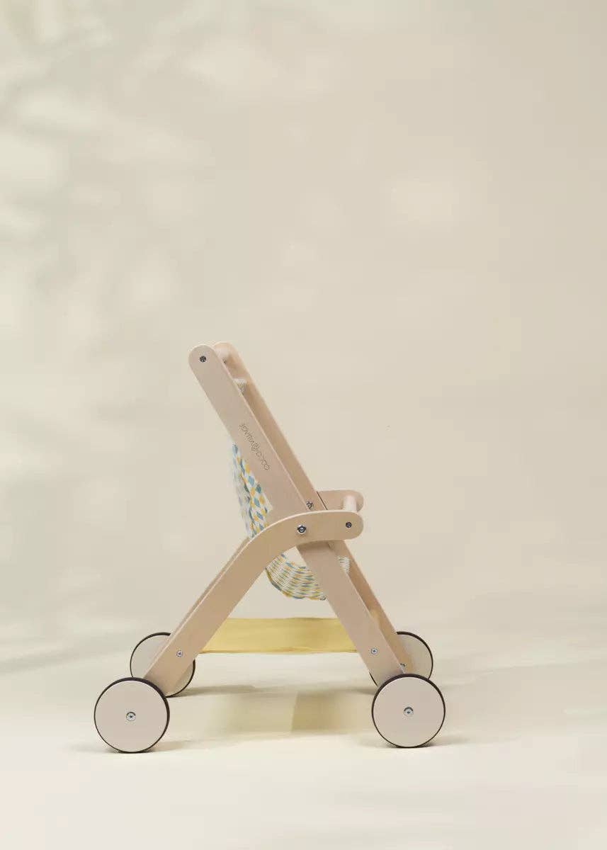 Wooden doll stroller shown from side angle
