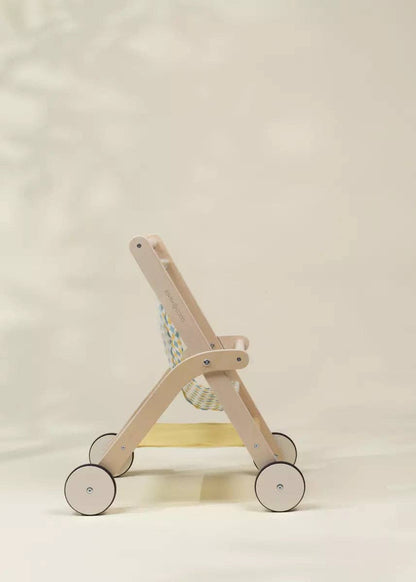 Wooden doll stroller shown from side angle
