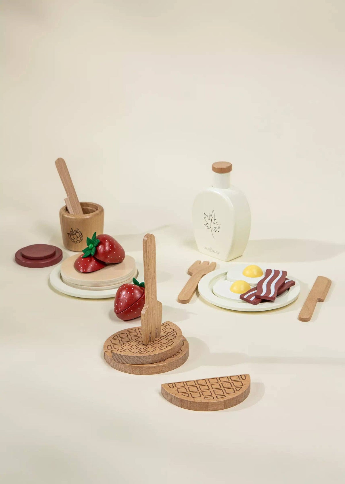 Wooden brunch playset with pretend food pieces on white background