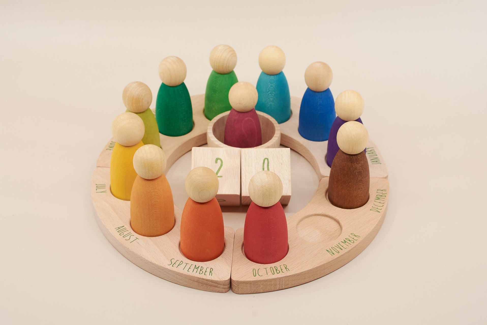 Rainbow calendar toy natural wood Barn and Bunny close up wood texture