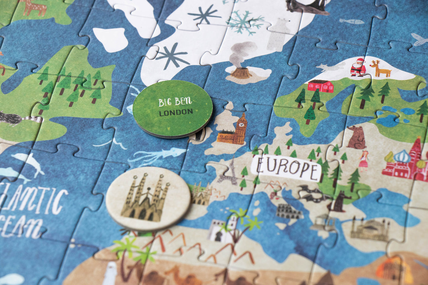 Children's puzzle map of Europe with landmarks and a Big Ben button.