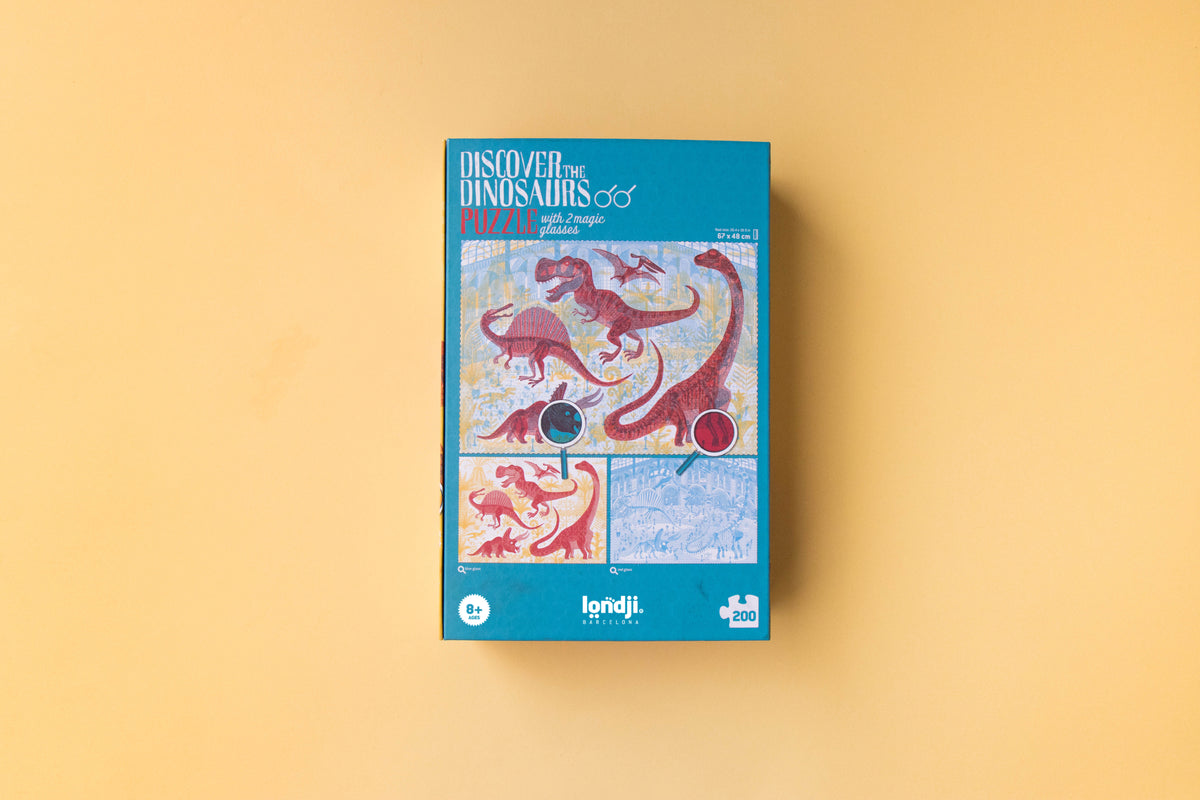 Discover the Dinosaurs puzzle blue magnifying glass detail