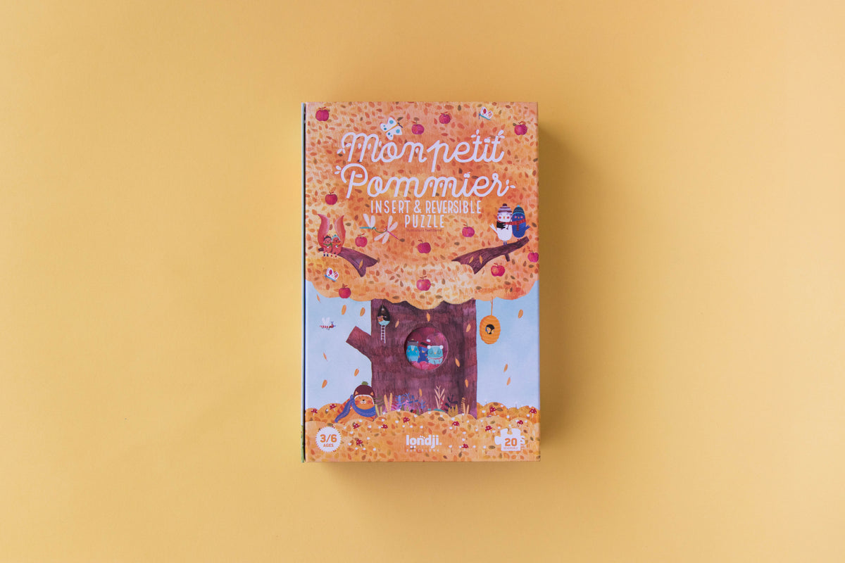 Close-up of Mon Petit Pommier puzzle animal pieces