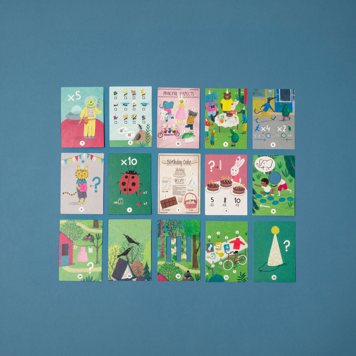 Set of colorful children's educational posters on a blue wall