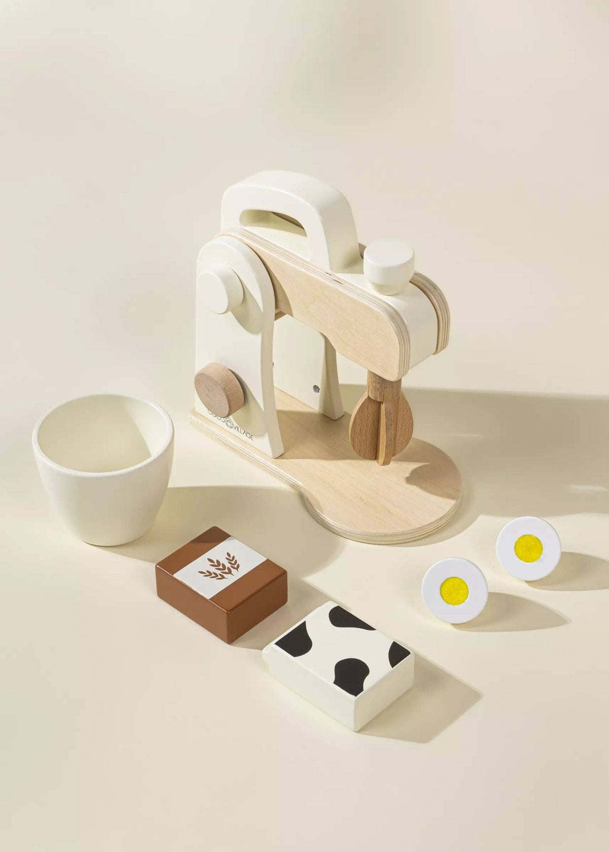 Close-up of wooden stand mixer rotating bowl and button