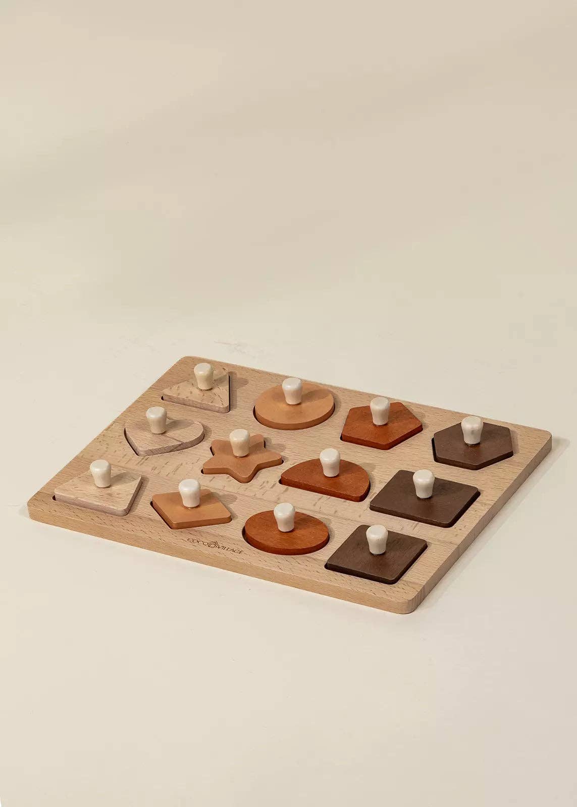 Wooden shapes puzzle pieces separated and displayed